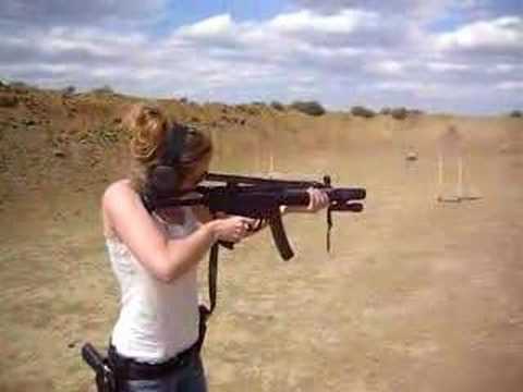 Girl Shooting an MP5