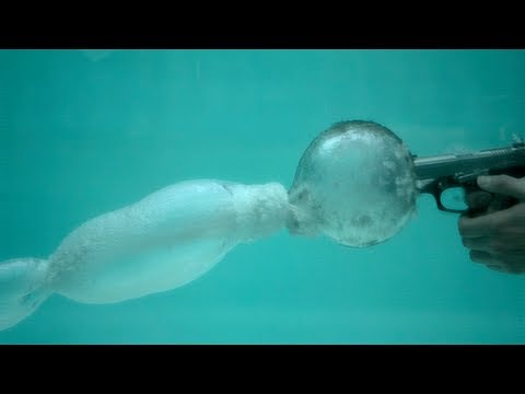 Slow Motion Footage - Guns Fired Under Water