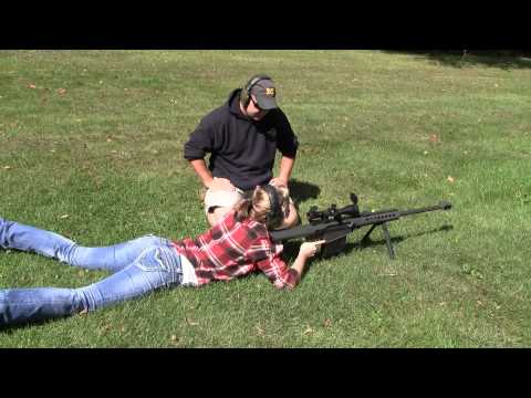 Mallory Shooting a 50 BMG Rifle