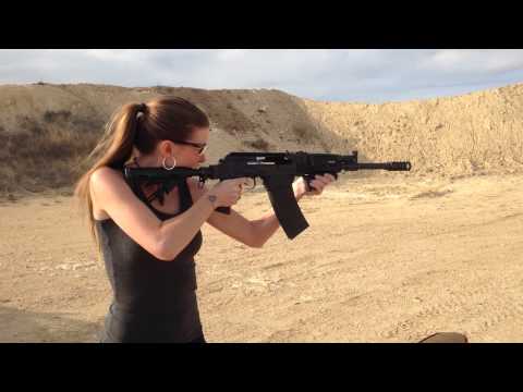 Kirsten Joy Weiss Shooting a SAIGA-12 Shotgun